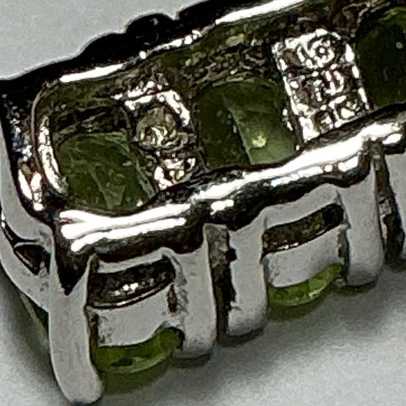 Sterling Silver Stud Earrings with Faceted Peridot Stones l 9/16 inch long - Picture 10 of 10